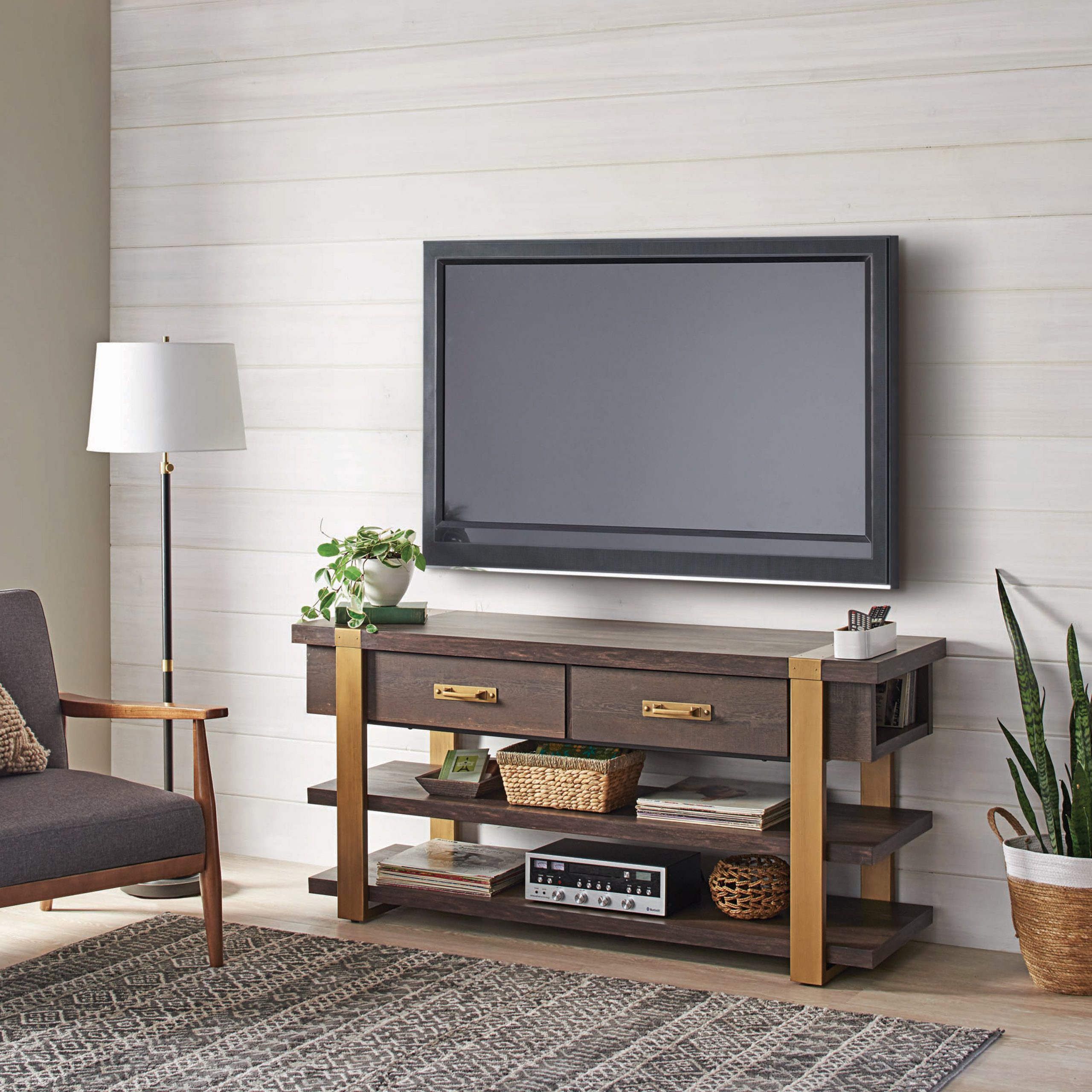 Modern and sleek! Check out this TV stand that Somers Furniture designed,  not only does it work perfe…